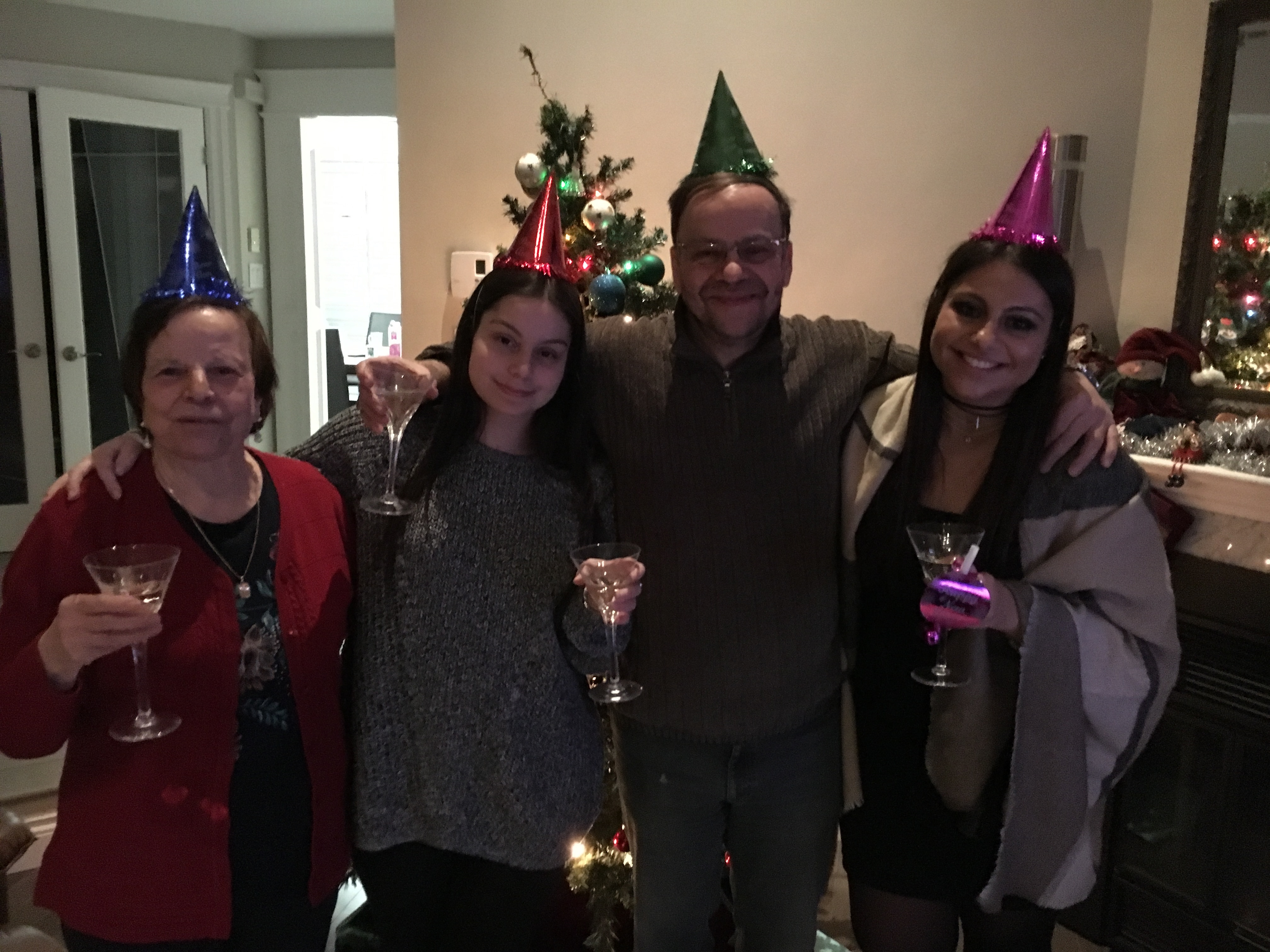 photograph of my grandmother, father, sister and I celebrating the New Year of 2017